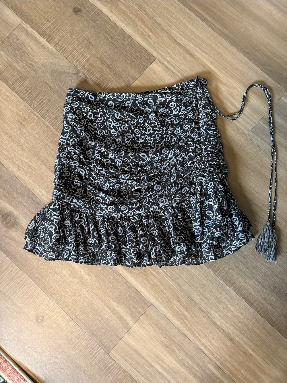 Veronica Bears black with white and light blue floral ruched ruffle Mini Skirt.